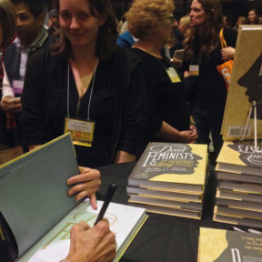 Signing the Dead Feminists book at the PNBA Trade Show in Tacoma, WA.